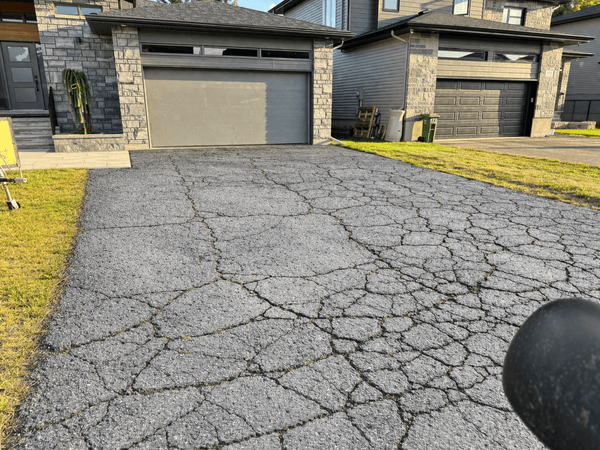 Driveway with extensive cracking
